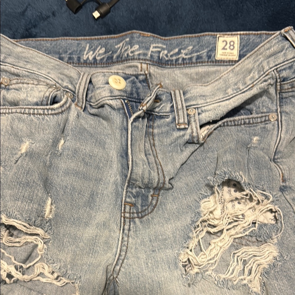 We The Free Blue Boyfriend Jeans with Distressed Detailing